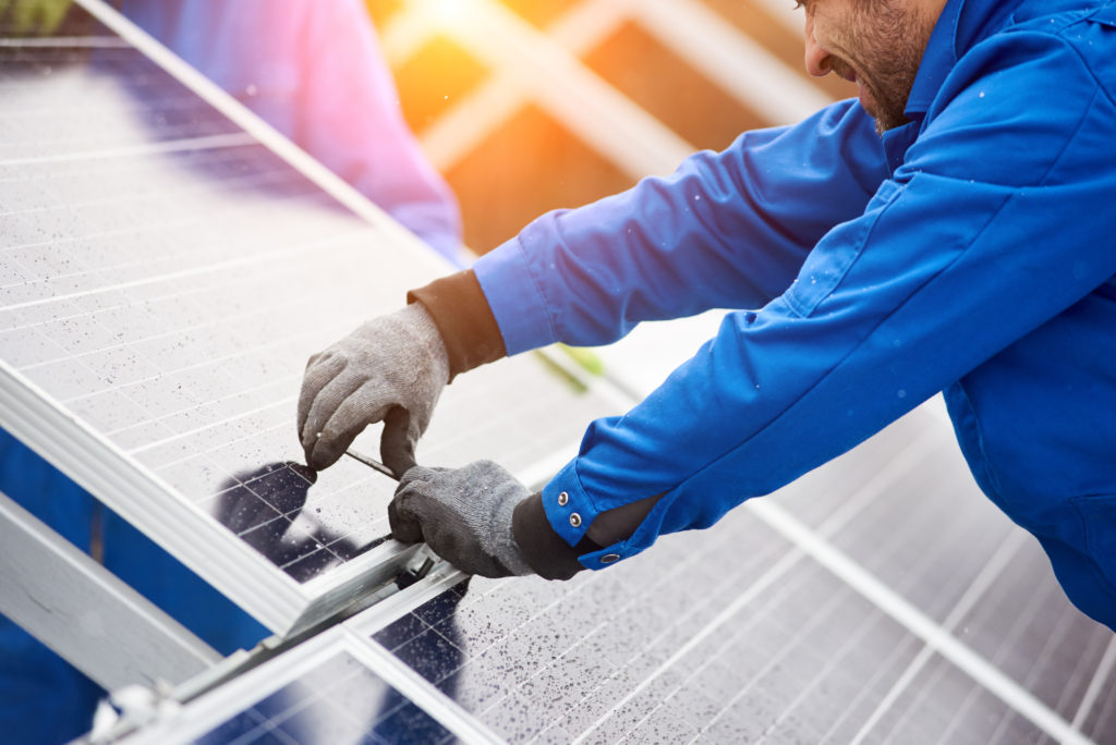 solar working installing panels